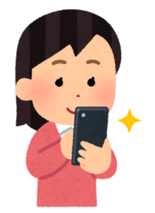 スマホを見る人